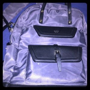 A computer book bag color black and gray